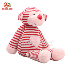 Macaco de brinquedo de pelúcia macaco-de-rosa e vermelho com bordado coração de amor